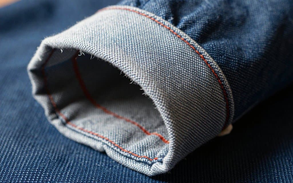 Macro of the red selvedge line inside a vintage Levis denim cuff