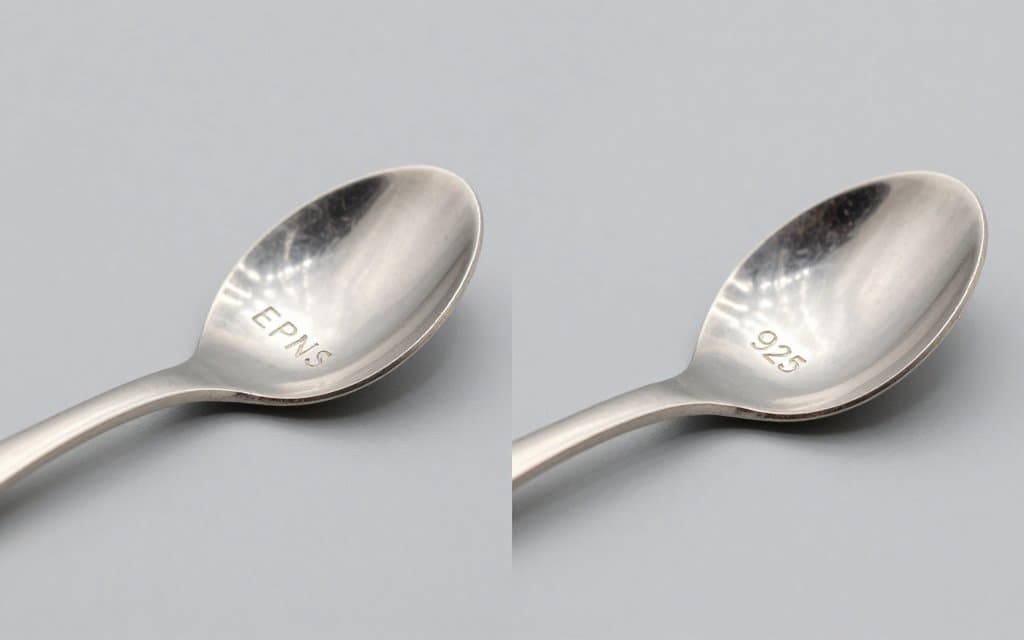 Comparison of an EPNS plated mark and a 925 sterling mark on two spoon handles