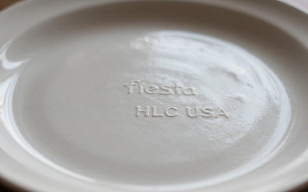 Close up of vintage Fiesta markings, the lowercase genuine fiesta HLC USA base stamp