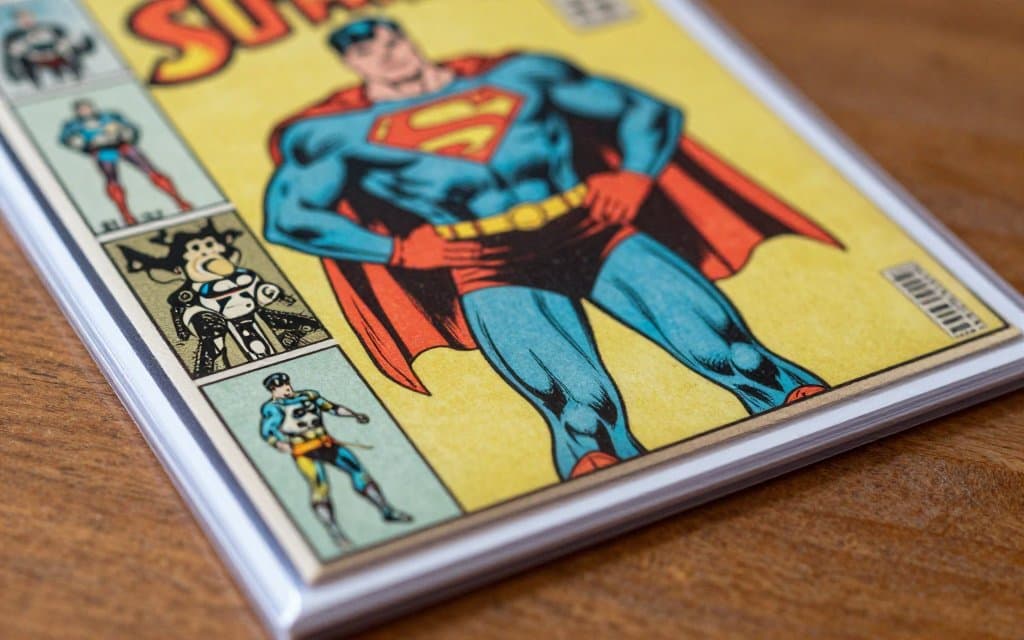 Close up of a Silver Age key issue comic cover in a mylar sleeve on a table