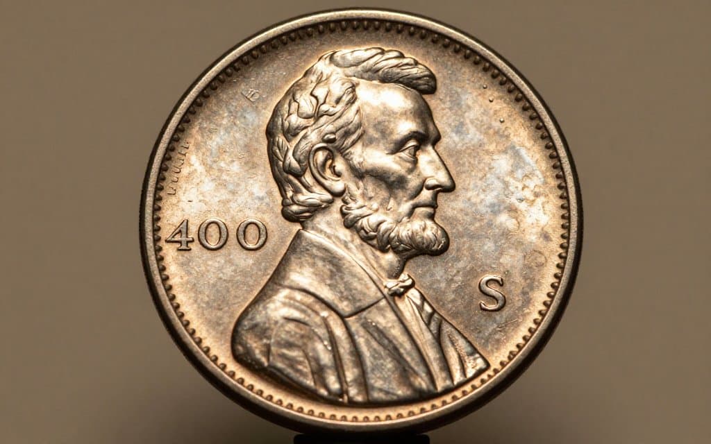 Close macro of a wheat penny date and mint mark, the wheat penny mint marks that change the value.