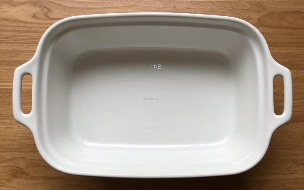 Top-down view of a vintage CorningWare base stamp and A-series date code