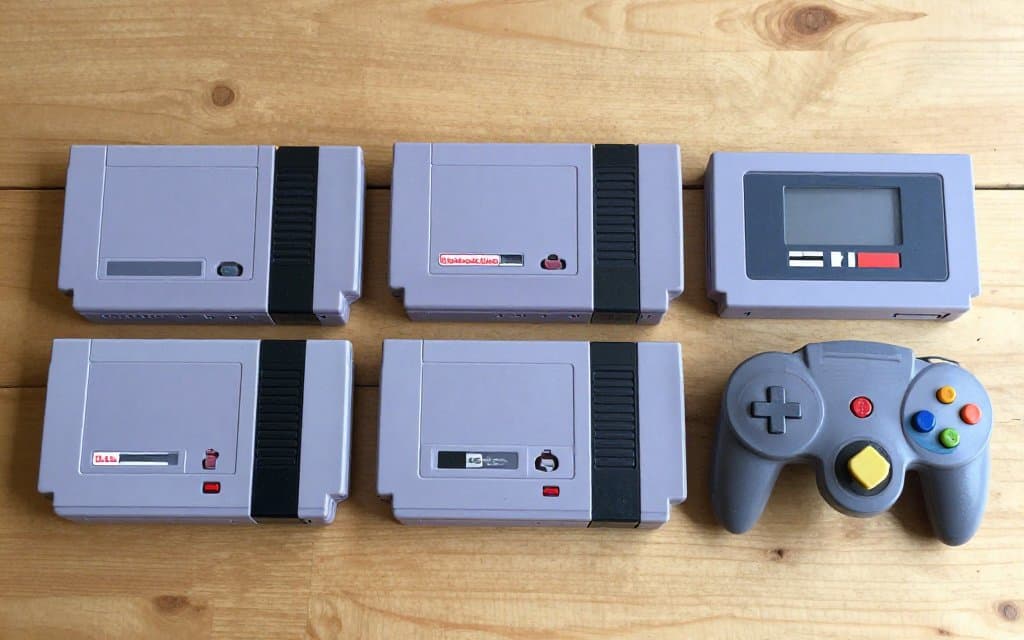 Top-down view of NES, SNES, Nintendo 64, and GameCube game cartridges